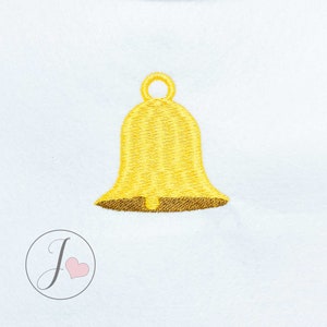 May include: A gold bell ornament with a loop at the top. The bell is embroidered with yellow thread and has a brown outline.