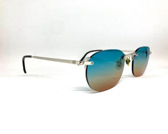 Vintage Cartier T-eye Titanium Rimless Sunglasses