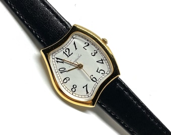 Orologio vintage a fusione irregolare asimmetrica