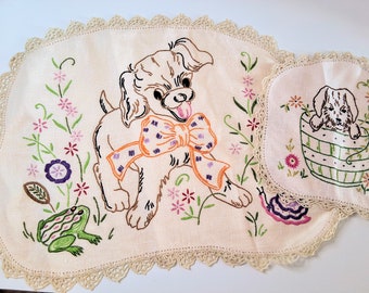 Doggy doilies x 2, vintage dressing table linens, handstitched dog pictures on cloth.