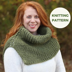 May include: A woman wearing a green knitted cowl neck warmer. The cowl is a solid olive green color and has a ribbed texture. The image includes a white circle with the words "KNITTING PATTERN" in green.