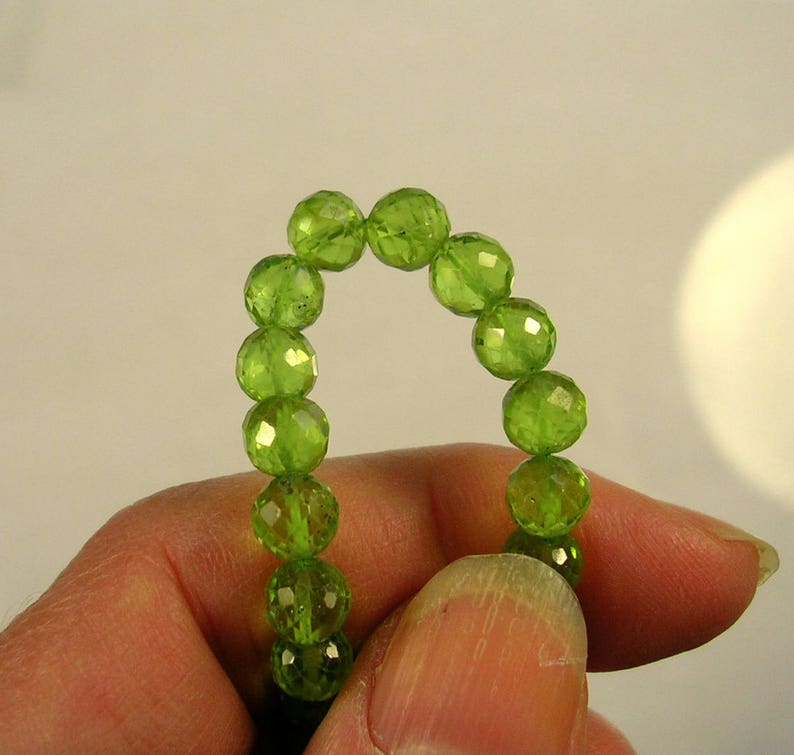 Peridot faceted round beads AA 5.5mm 7 strand