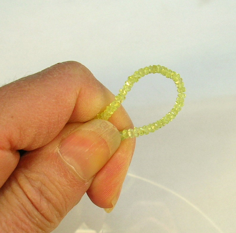 Chrysoberyl faceted rondelle beads AAA 2-3mm 9 strand