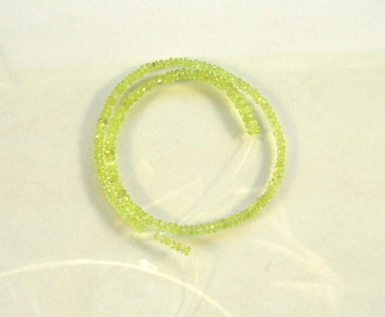 Chrysoberyl faceted rondelle beads AAA 2-3mm 9 strand