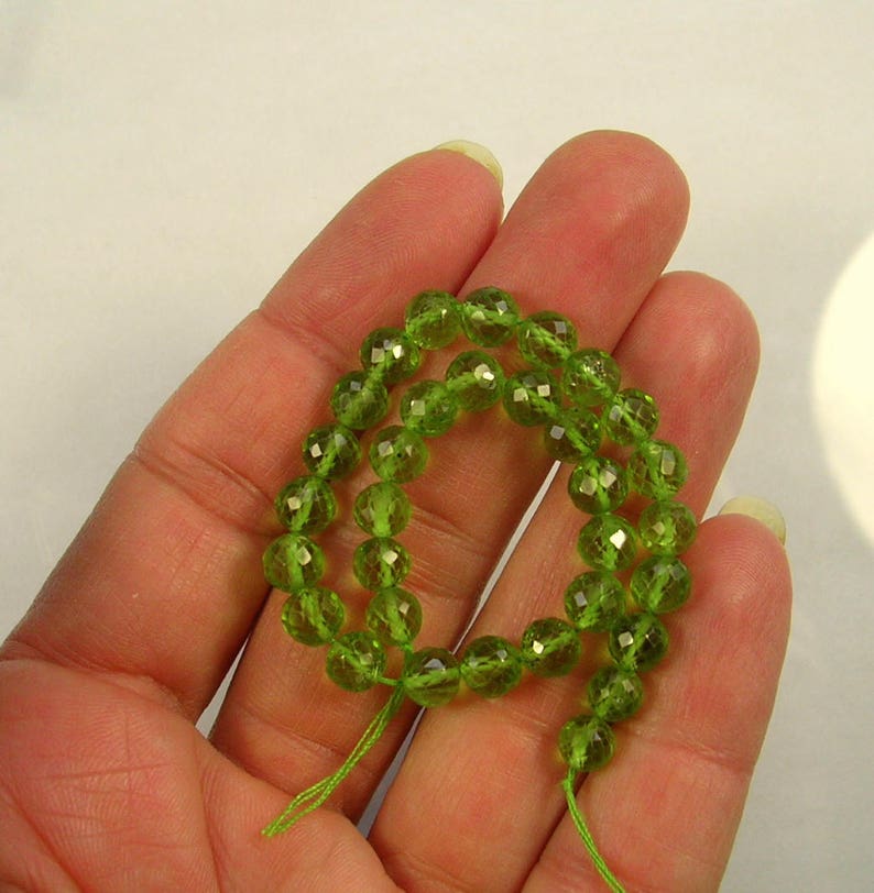 Peridot faceted round beads AA 5.5mm 7 strand