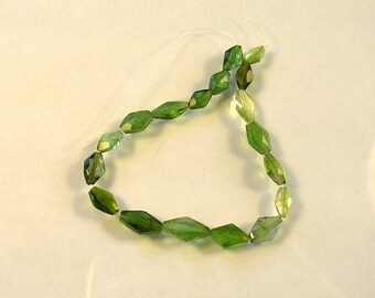 Shaded green tourmaline faceted lozenge bead AAA 7-10mm 5.5" strand