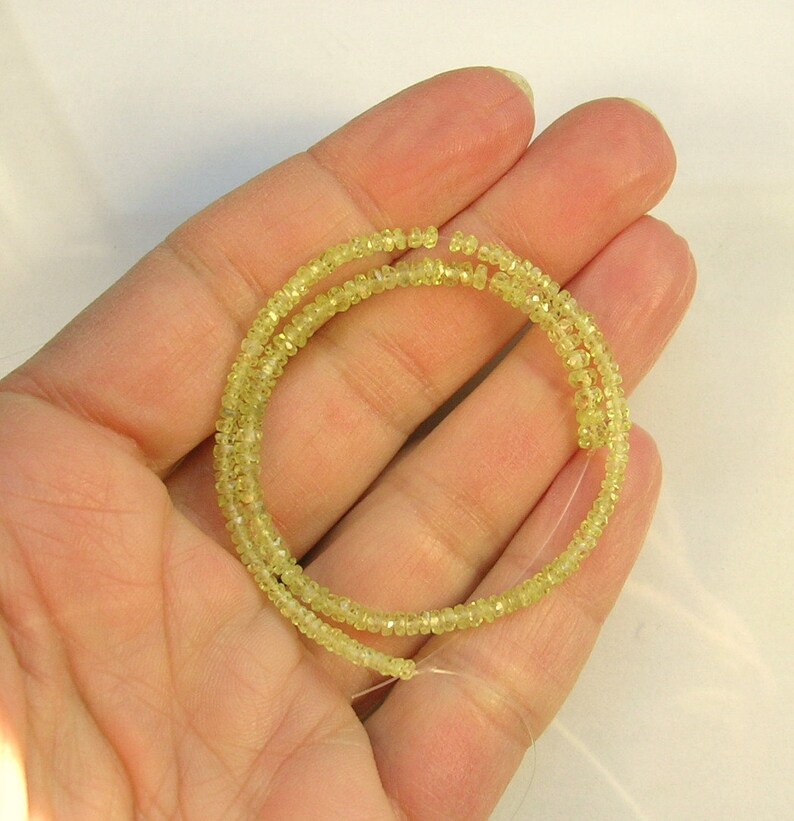 Chrysoberyl faceted rondelle beads AAA 2-3mm 9 strand