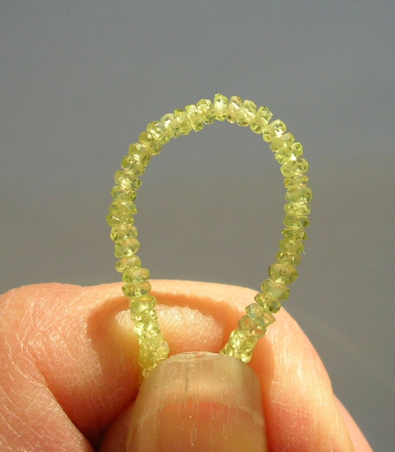 Chrysoberyl faceted rondelle beads AAA 2-3mm 9 strand