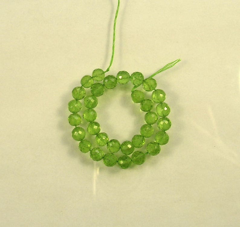 Peridot faceted round beads AA 5.5mm 7 strand