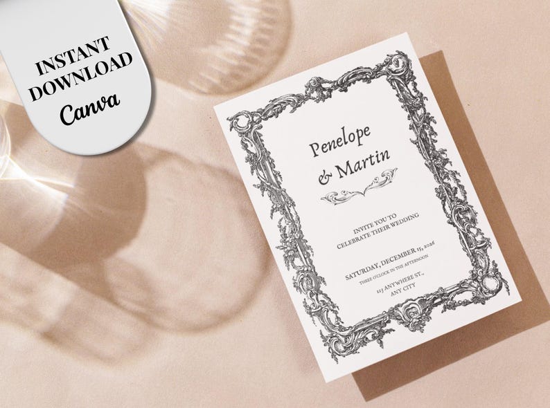 May include: A white wedding invitation card featuring a black ornate baroque-style frame border. The text reads Penelope & Martin, invite you to celebrate their wedding, Saturday, December 15, 2026, three o'clock in the afternoon, 123 anywhere st., any city.