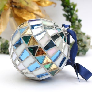 Christmas balls decorated by hand in Italy. Artistic glass mosaic Christmas balls. Christmas ornament in mosaic. Blue