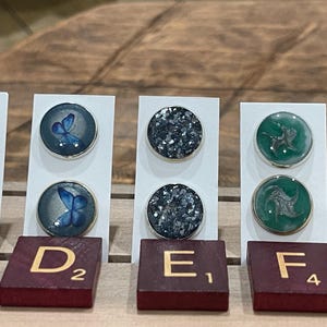 Knopf Ohrstecker Swirled Patterns UV-Harz mit Beiträge