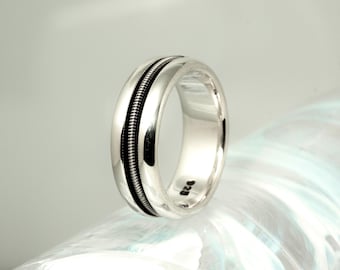 Anillo de cuerda de guitarra de plata de ley maciza