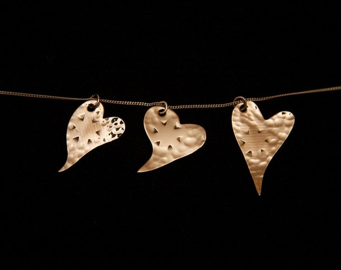 Beautiful, handmade Heart pendants, made from recycled cymbal bronze. Perfect drummer gift!