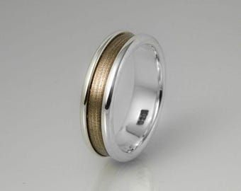 Anillo platillo de bronce y plata de ley.