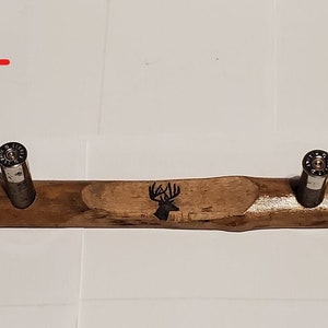 Coat/hat hanger made from MAPLE . Buck stamp, shotgun shell pegs HANDMADE