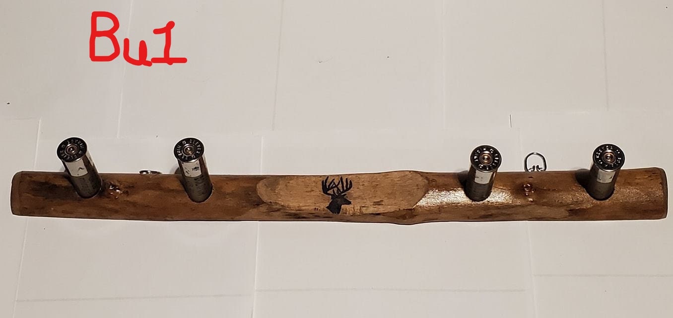 Coat/hat hanger made from MAPLE . Buck stamp, shotgun shell pegs HANDMADE