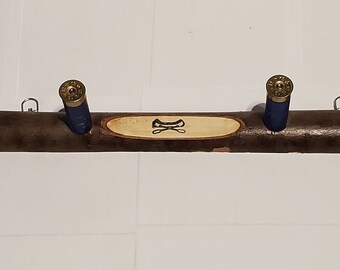Coat/hat hanger made from MAPLE . Canoe stamp, shotgun shell pegs HANDMADE