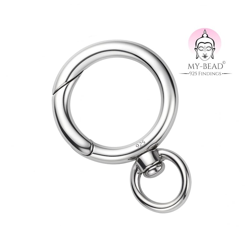 May include: A shiny silver-colored clasp with a large circular ring and a smaller attached ring. The clasp is marked with "925" and has a hinged opening. The image also includes a logo with the text "MY-BEAD - 925 FINDINGS".