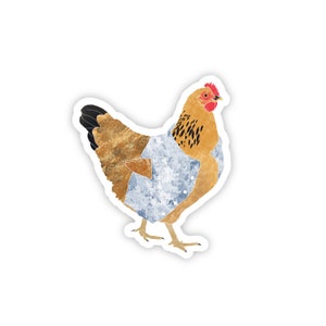 May include: A brown and gold chicken wearing a blue denim shirt. The chicken is standing on a white background.