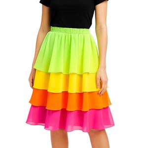 May include: A tiered skirt in vibrant neon colors: lime green, yellow, orange, and hot pink. The skirt has an elastic waistband and a flowing, layered design. The skirt is knee-length and made of a lightweight fabric.