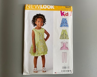 New Look Sewing Pattern - Kids Dress & Leggins / Childs Dress - 3 Designs - 5 Sizes - See Photos - New Look 6521 - New and Uncut