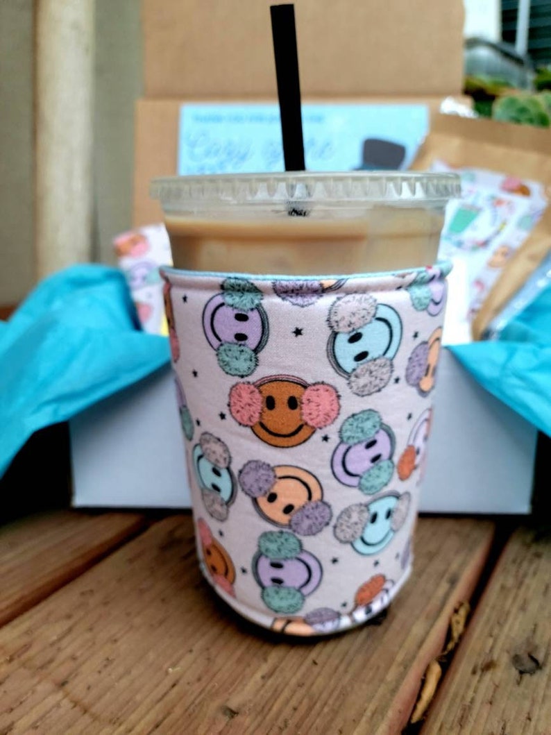 Smiley Face Ear Muffs Iced Coffee Cozy, Insulated Iced Drink Sleeve image 1