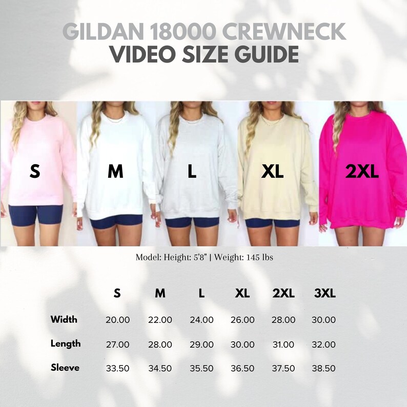 Pode incluir: Guia de tamanhos em v&iacute;deo para moletom Gildan 18000 com cinco modelos de manga comprida nos tamanhos S, M, L, XL e 2XL. Uma tabela lista medidas de largura, comprimento e manga em polegadas para tamanhos S a 3XL, modelo 5'8" e 145 lbs.