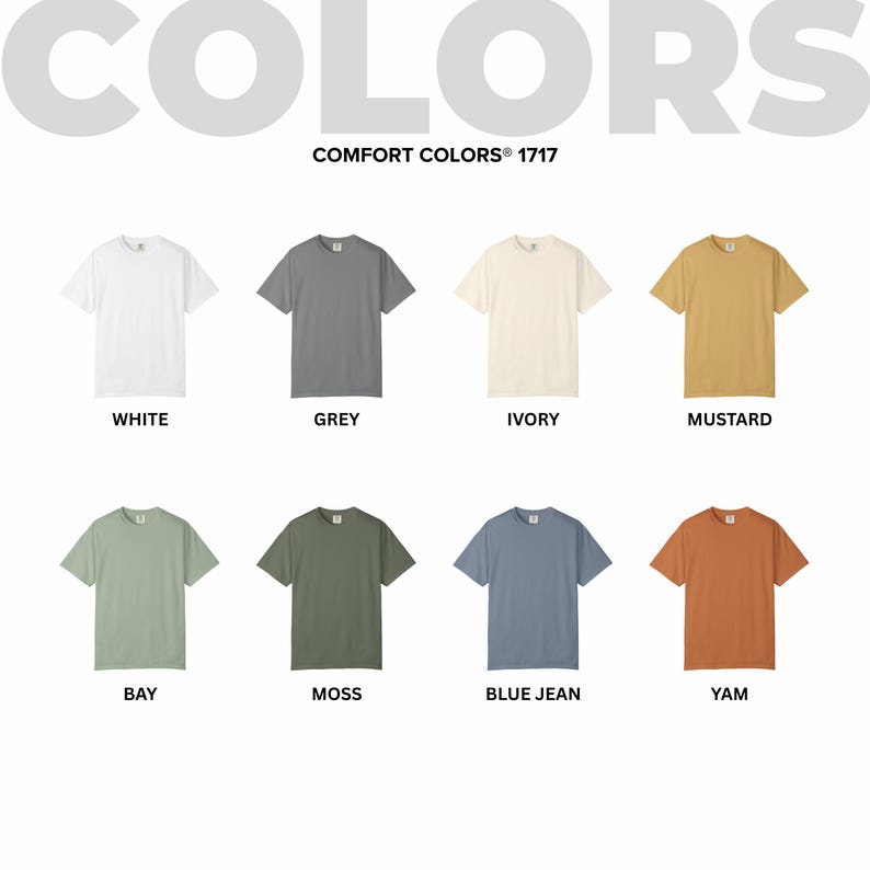 May include: A display of eight Comfort Colors 1717 t-shirts in various colors, including white, grey, ivory, mustard, bay, moss, blue jean, and yam. The word "COLORS" is at the top, with each shirt labeled with its color name.