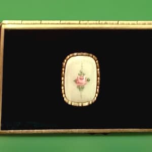 May include: A set of three ceramic mugs with a speckled, matte finish. The mugs are in shades of cream, light gray, and dark gray. Each mug has a simple, minimalist design, perfect for coffee or tea.