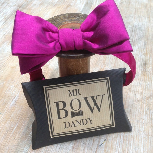 Dapper Bow Tie in Magenta. Sumptuous 100% silk with satin adjustable neck fitting available in over 50 colours and patterns