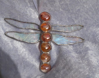 Beautiful stained glass orange dragonfly