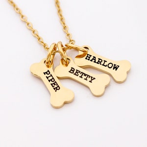 personalized dog bone charm necklace in gold