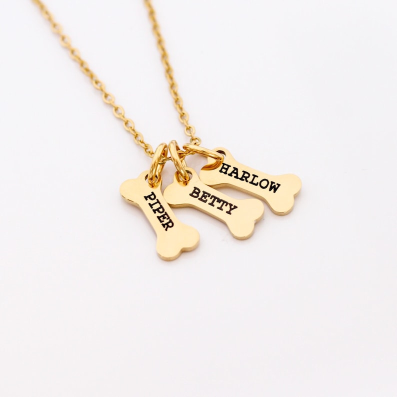 personalized dog bone charm necklace in gold