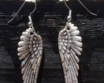 Handmade wing earrings, surgical steel.