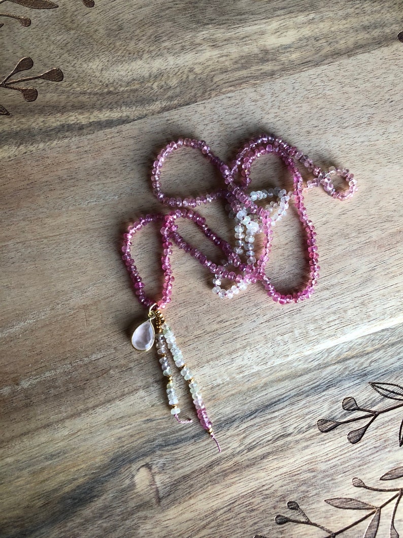 Umba Sapphire necklace featuring a Rose Quartz charm and 24k Gold vermeil accents
