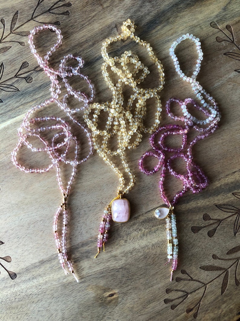 Umba Sapphire necklace featuring a Rose Quartz charm and 24k Gold vermeil accents