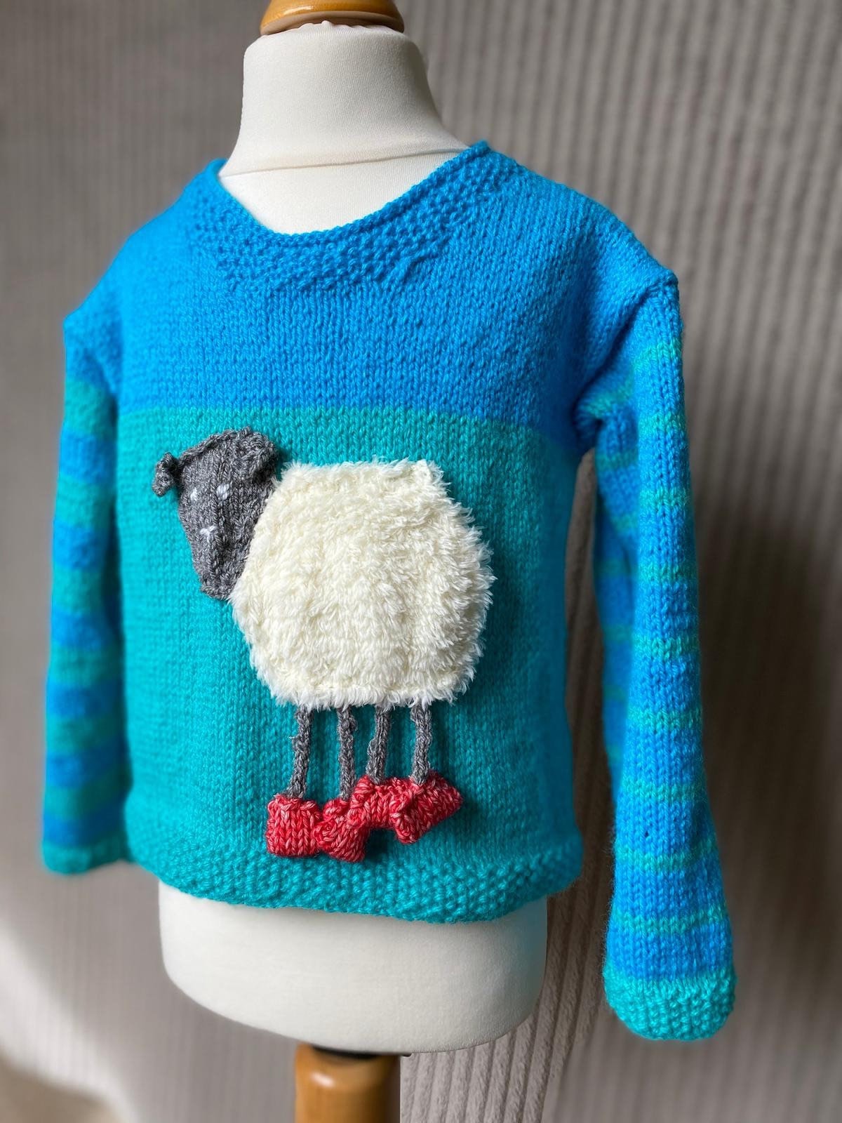 jumper with sheep