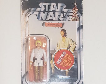 Kenner RETRO (reissue of vintage 70s figure) Star Wars Luke Skywalker carded figure