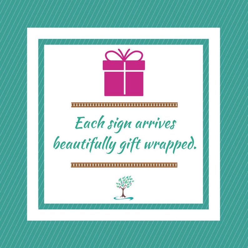 May include: A white square with a teal border and a pink gift box inside. The text "Each sign arrives beautifully gift wrapped." is below the box. A small tree with green leaves is below the text.