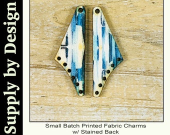 SB1092 pair of Artisan printed fabric decoupage on wood charms. w/ stained back  1.75" x .5"  1/8" thick