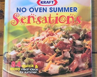 May include: A Kraft cookbook titled "No Oven Summer Sensations" with a colorful salad on the cover. The cover features the text "84 quick & easy meal ideas for summer".