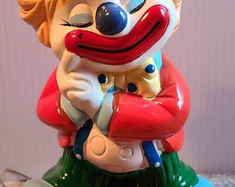 Hucha de plástico con forma de payaso de la colección Big Top Bonanza de Del Monte, año 1985.