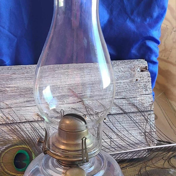 Vintage kerosene oil lamp with crack