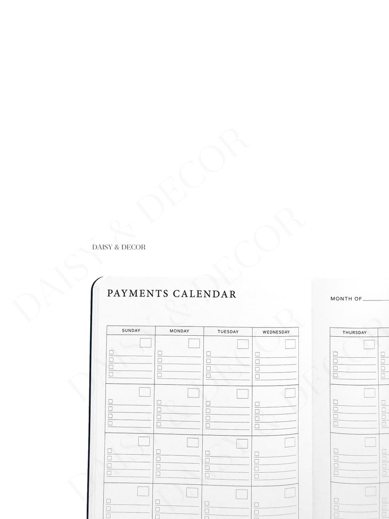 May include: A white Payments Calendar with a black border. The calendar is open, showing a weekly layout with days of the week across the top and boxes for entries. The text "DAISY & DECOR" is at the top.