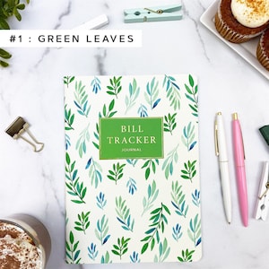 Puede incluir: Un diario blanco con un patr&oacute;n de hojas verdes y azules. La portada tiene un rect&aacute;ngulo verde con el texto "Bill Tracker Journal".