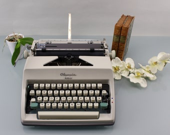 Vintage. Typewriter Olympia MONICA Working typewriter Office equipment Office Mechanical typewriter 1960s