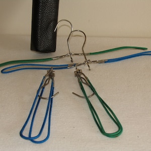 Pack of 4 retro coat hangers with bag from the 50s with fabric cover Mid Century travel coat hangers