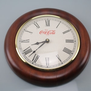 Coca Cola clock for decoration only Wall clock defect Made in West Germany Lauermann
