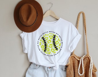 May include: White t-shirt with a yellow and black softball graphic and the text "Every Batter Matters,  Hey Batter Batter".